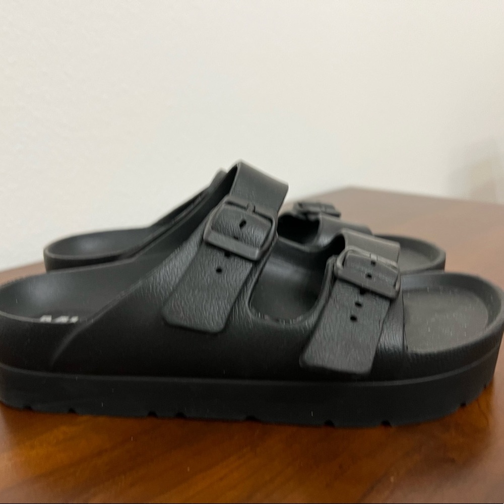 Black sandals. Never worn.